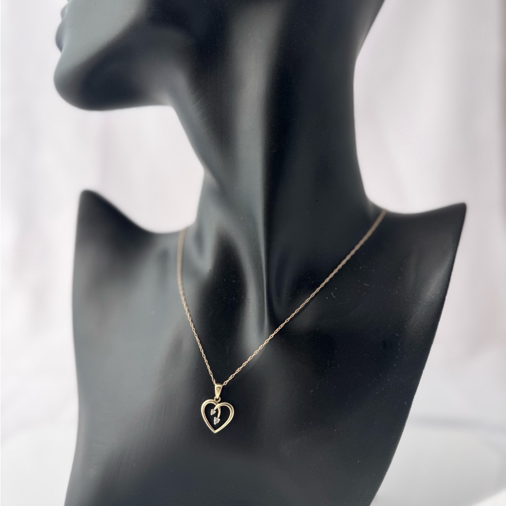10kt goldHeart Pendant and Necklace with diamonds.
